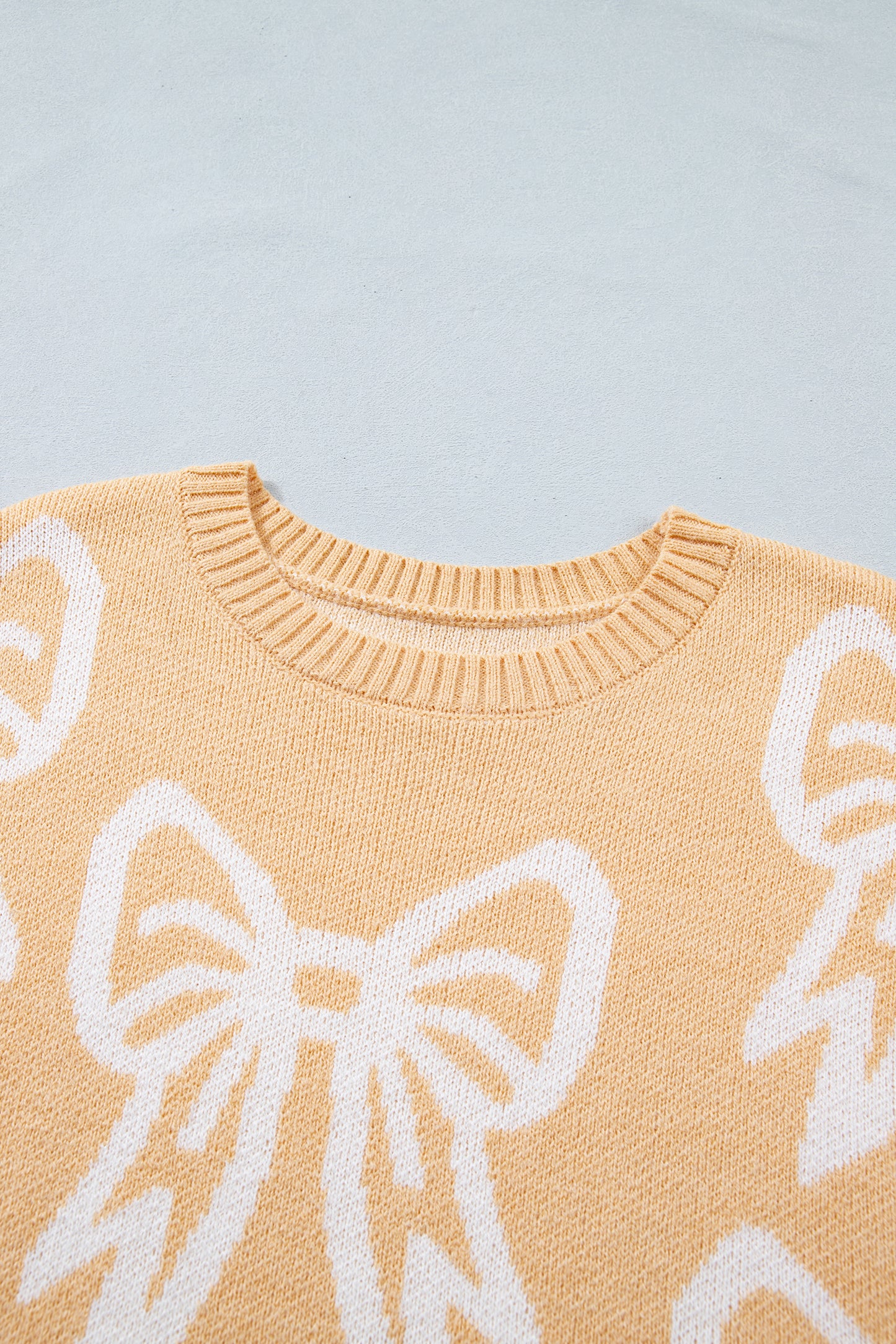 Golden Fleece Bow Pattern Drop Shoulder Loose Sweater